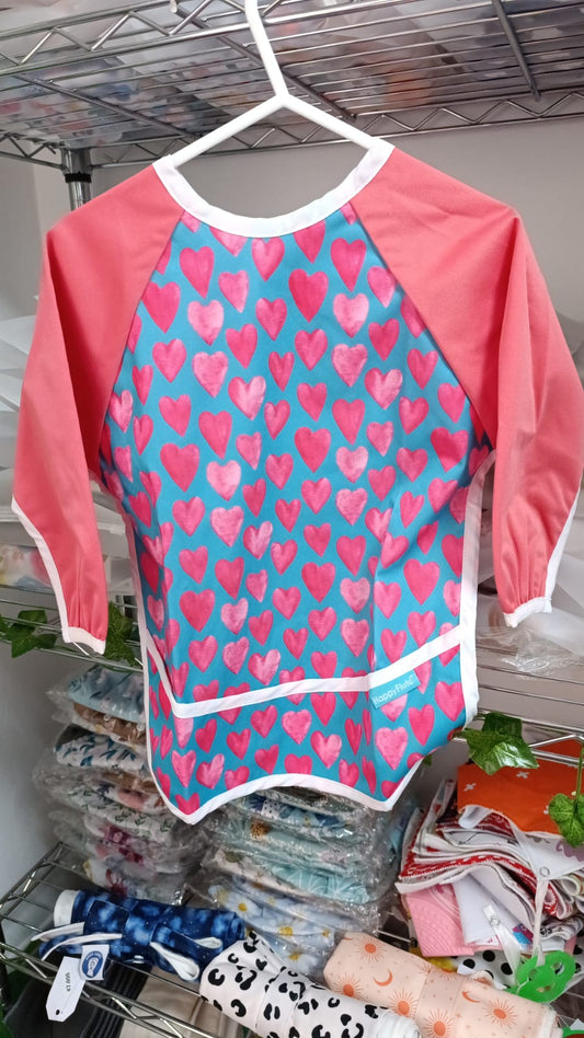 Babero impermeable manga larga