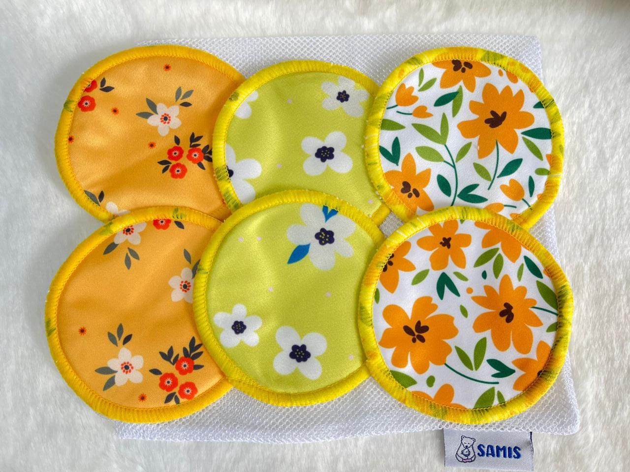 Protectores de lactancia reutilizables de 10 cms de diámetro.